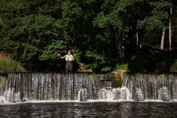 Fishing by the Falls